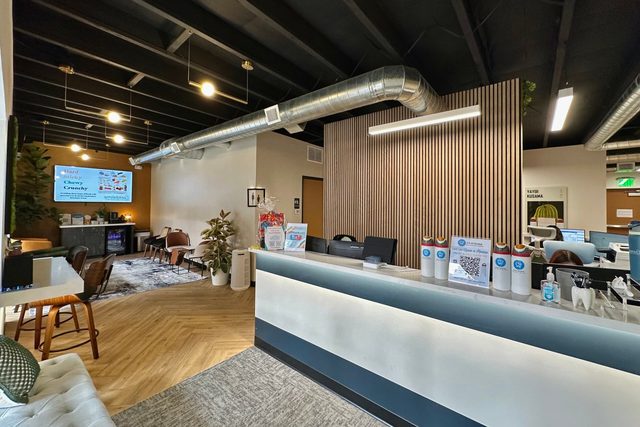 Front desk and patient lobby at IGO Dental & Implant Center in Tempe, Arizona